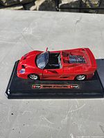 Model car on base profile view