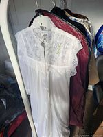 Full view of nightgown robe on hanger