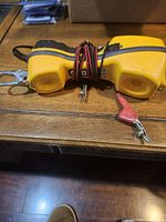 Full view of yellow test set with leads wrapped