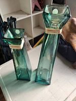 Both green glass vases together showing size difference and square form