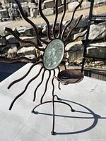 Side angle displaying candle platform and stand