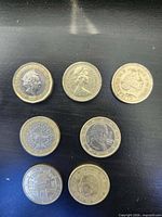 All seven coins obverse sides