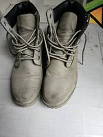 Top view of pair of tan nubuck Ozark Trail lace-up boots