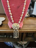 Full view of necklace on display bust