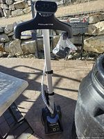 Full view of Rowenta garment steamer with hanger, hose, base and accessory bag