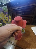 Pendant necklace on display bust