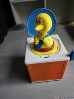 Big Bird figure popped up from jack-in-the-box