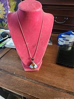 Full view of necklace on display bust