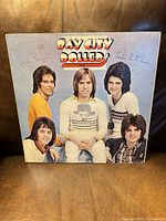 Front cover of Rollin' LP showing band portrait and logo