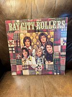 Front cover showing Bay City Rollers plaid design sleeve