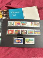 Front cover of stamp booklet with mounted mint stamps displayed