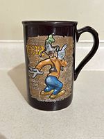 Full view of mug front with raised Goofy and 1932 text