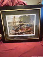 Framed limited edition print of Tom Thomson “The Canoe” showing entire artwork and frame