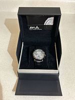 Watch in open presentation box