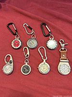 All seven clip-on quartz watches displayed