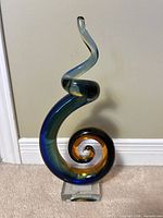 Full view of Murano spiral glass sculpture on base