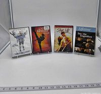 Front view of all four sealed DVD cases