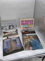 Front view showing five LP jackets including Roy Orbison, compilation, Mel Tillis