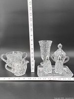 Group shot showing all glass pieces with measuring tape