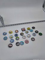 All pins laid out with measuring tape showing diameter