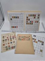 Overview of five album pages with mounted Japanese stamps