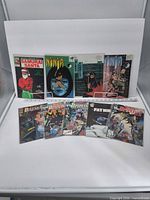 All nine comic books laid out for group view