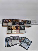 Front view showing majority of the 25 loose common cards