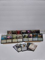 Group shot showing most of the ~25 Magic cards