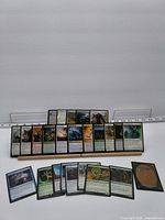 Front and back group view of all cards on stand