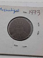 Obverse of 1973 Mozambique 50 Centavos coin in cardboard holder