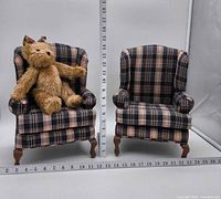 Pair of plaid miniature wingback chairs with teddy bear, rulers show approx. 14 in height