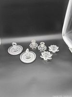 All six clear glass pieces arranged together