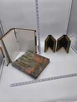 Overall lot showing two photo albums and two cassette storage blocks