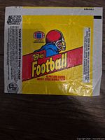 Front of 1981 Topps Football wax pack wrapper showing graphics and text