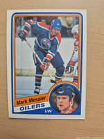 Front of card showing action photo, borders, player name and team