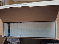 Side view of stacked 1987 Fleer cards in factory box