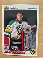 Front of Ed Belfour rookie card showing player and Blackhawks text