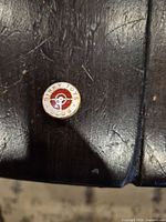 Front view of Dinky Toys Club enamel pin