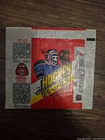 Front of O-Pee-Chee hockey wrapper showing goalie image, 15¢ price, 12 cards notice