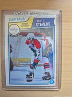 Front of Scott Stevens rookie card in plastic sleeve