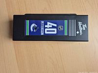 Closed black plastic case with Tim Hortons logo and Pettersson #40 graphic