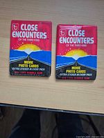 Front view of two sealed Close Encounters wax packs