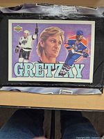 Front view showing entire Gretzky box bottom poster with portrait and two action images