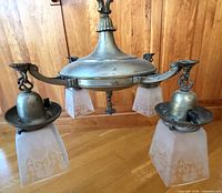 Overall view of chandelier showing frame and four shades