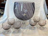 Front view of amethyst punch bowl with six cups