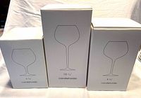 Three original white boxes showing outline of candleholder and heights 6 1⁄4, 10 1⁄4, 8 3⁄4 in