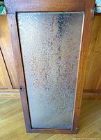 Front view of wood door showing full frosted glass panel