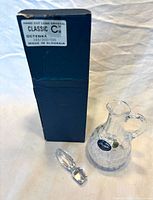 Box labelled Classic C VII with decanter and stopper displayed