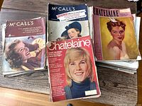 Stack of Chatelaine and McCall’s magazines showing covers from different decades
