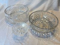 Front view of all three crystal bowls showing sizes and patterns